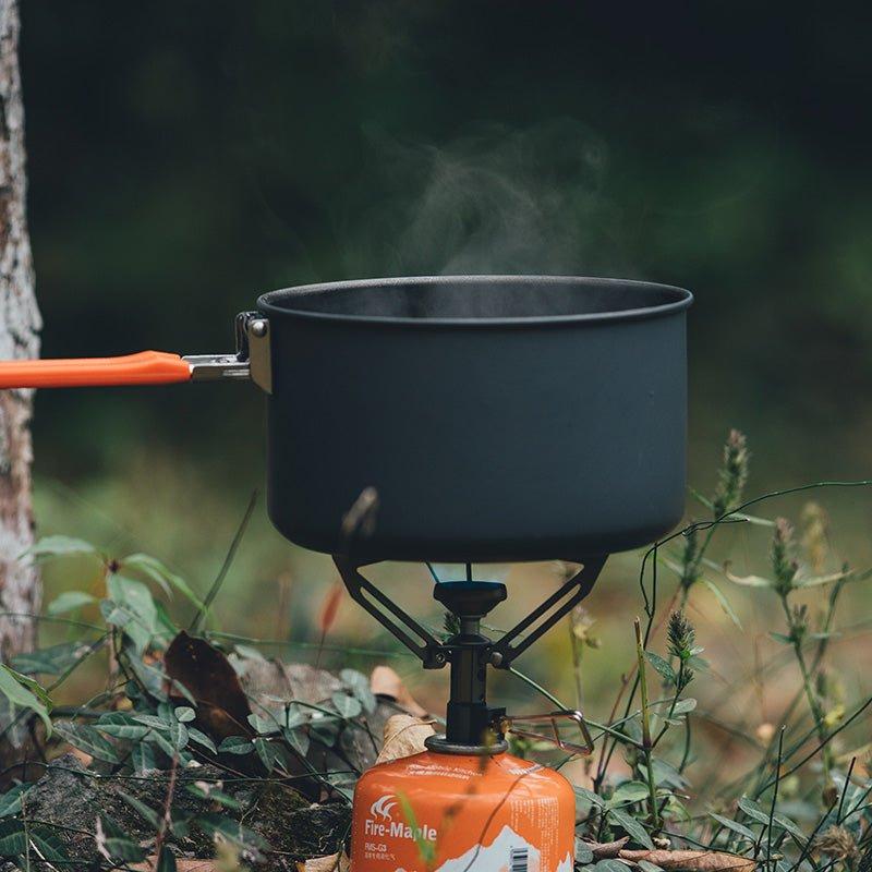 Compact backpacking stove cooking