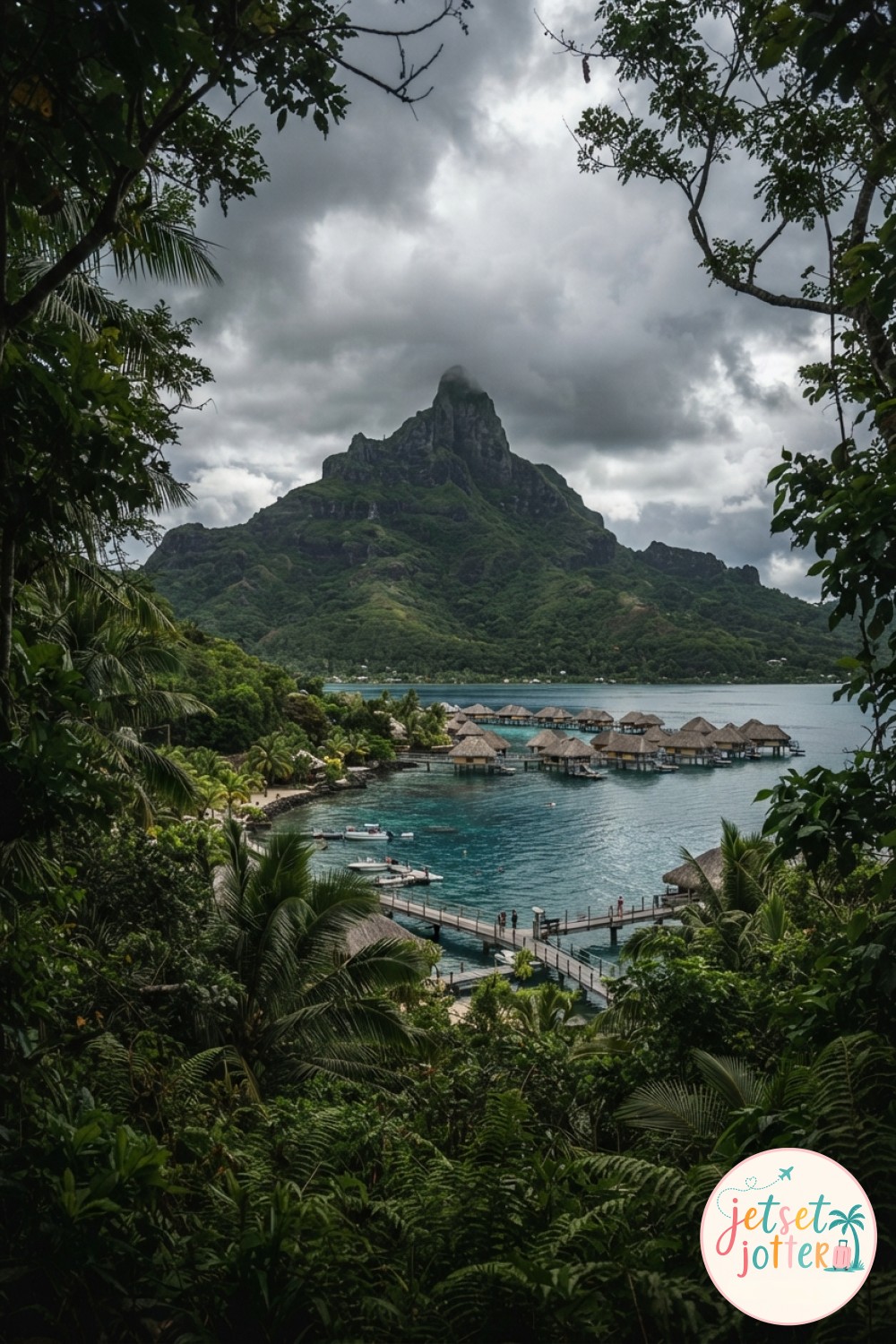 Mount Otemanu peak framed above overwater bungalows along a Bora Bora lagoon shoreline