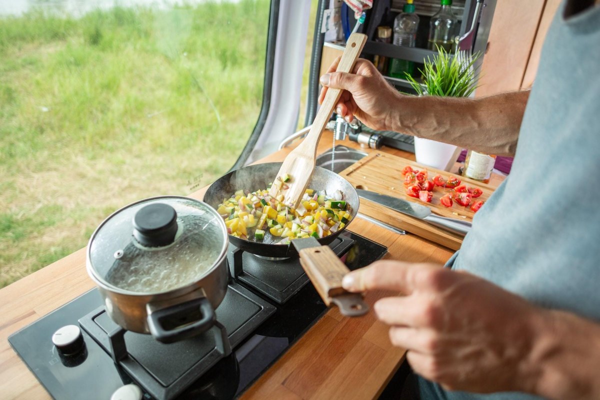 One pot meal cooking inside RV kitchen