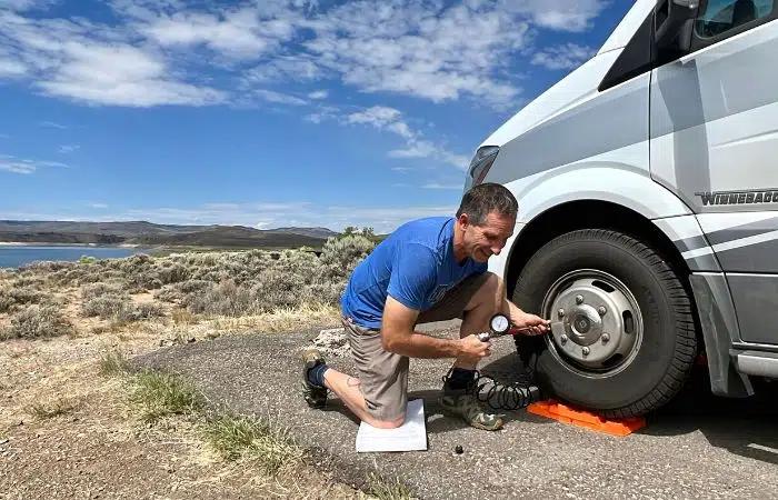 RV owner checking maintenance