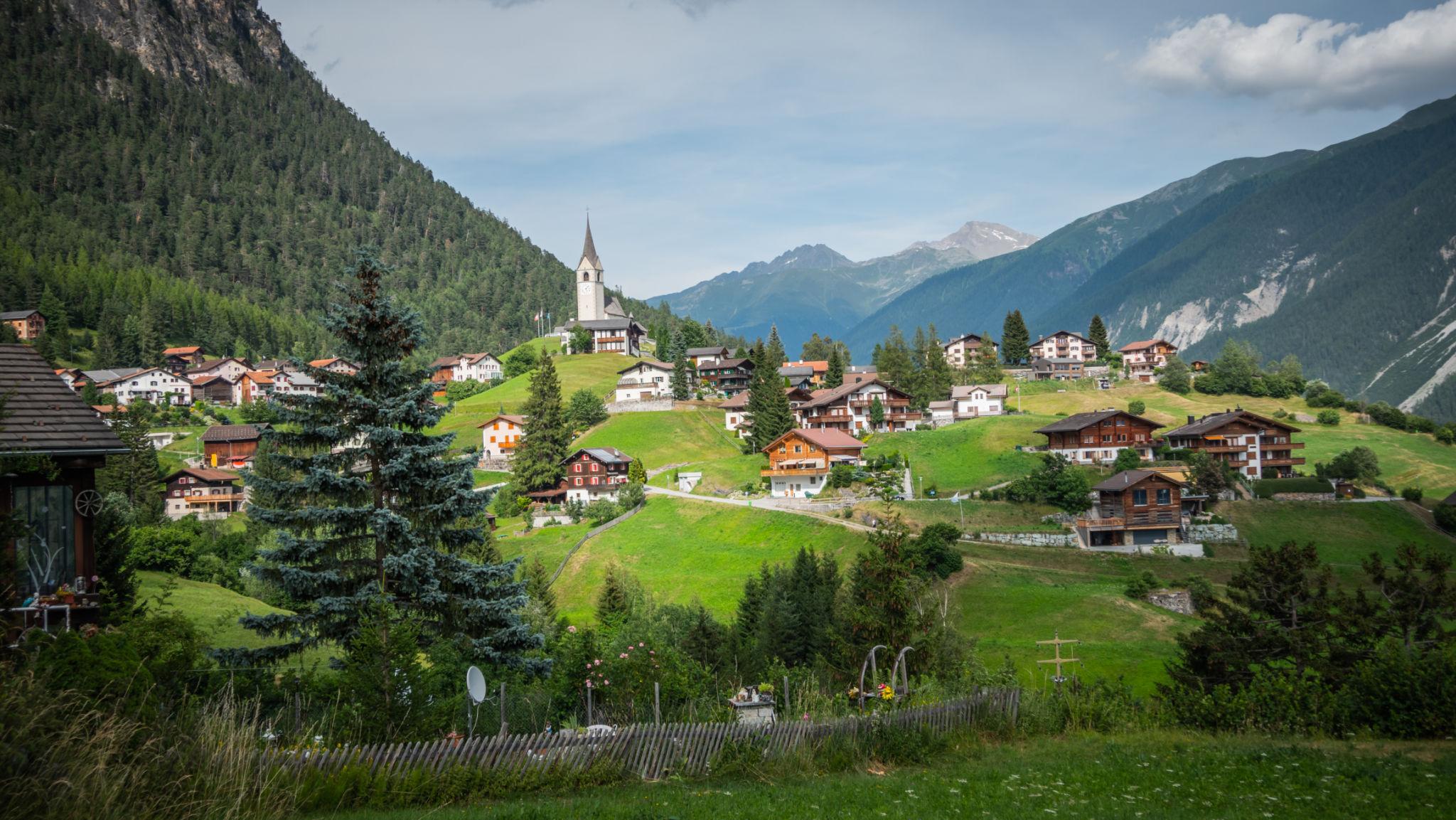 Swiss Alps village and mountains
