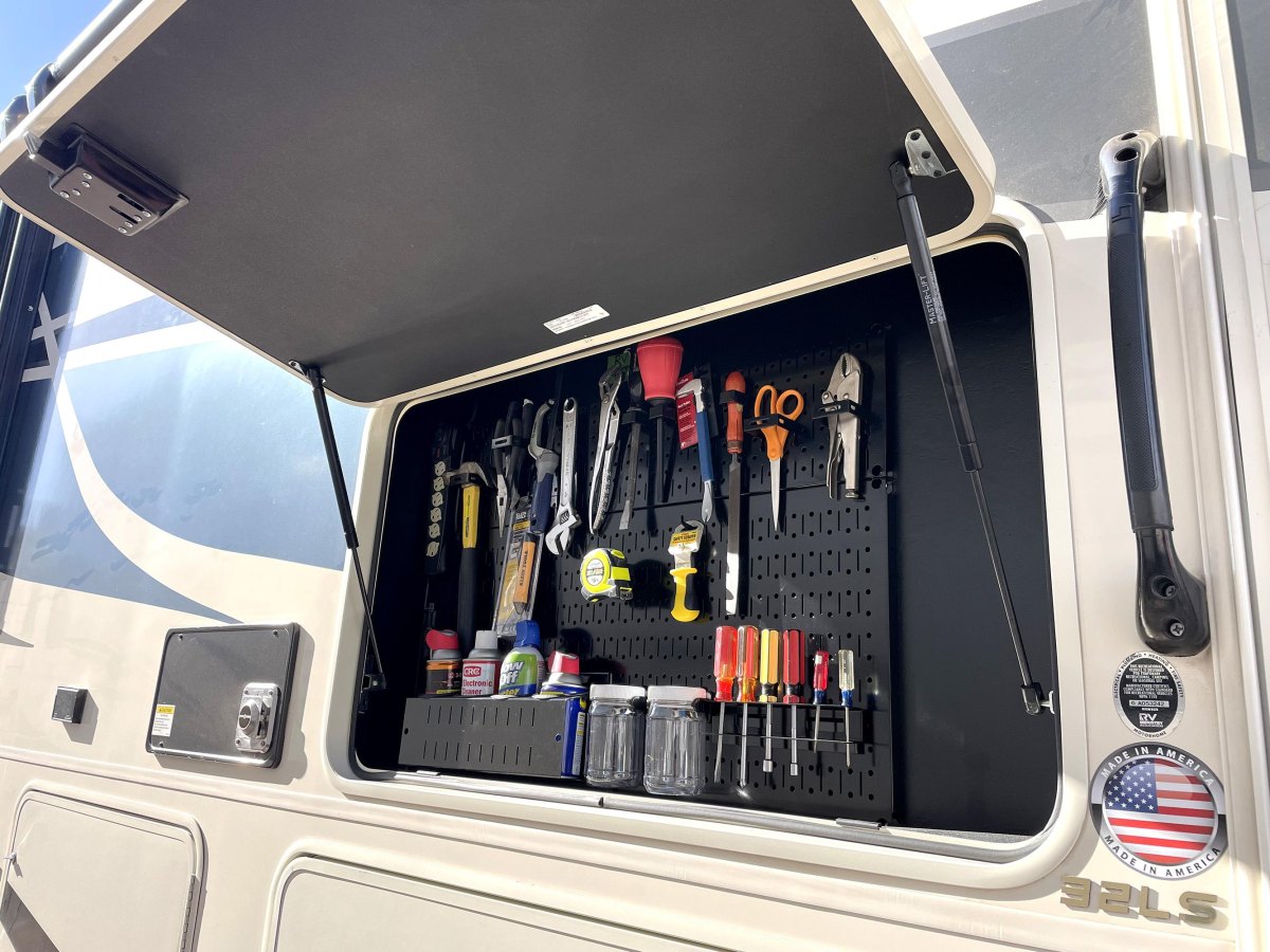 RV tool storage compartment