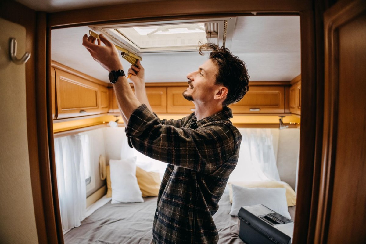 RV owner doing maintenance