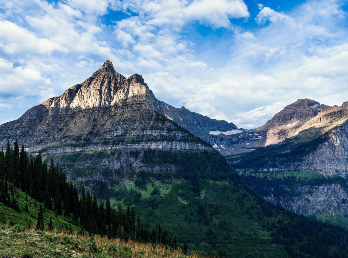 Mountain peaks above alpine trail