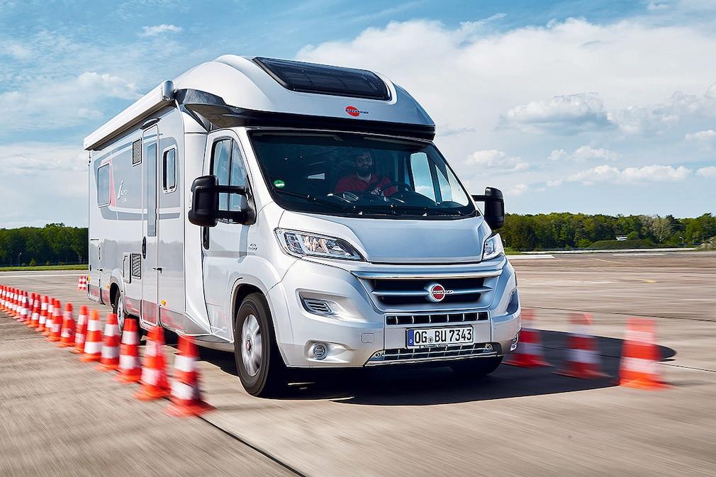 Person test driving motorhome