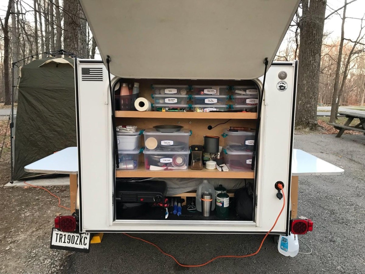 Camping gear beside trailer
