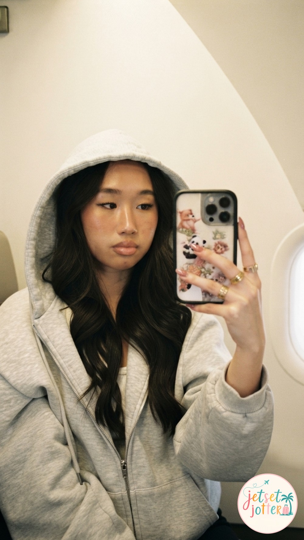 Plane selfie ideas: a selfie taken on the boarding stairs of a regional plane under a blue sky