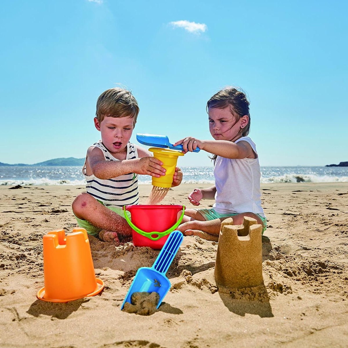 Children playing with sand toys