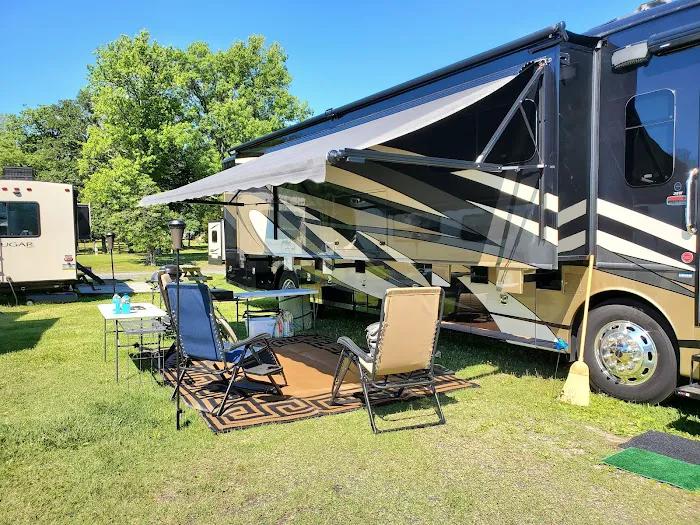 RV awning chairs campsite setup