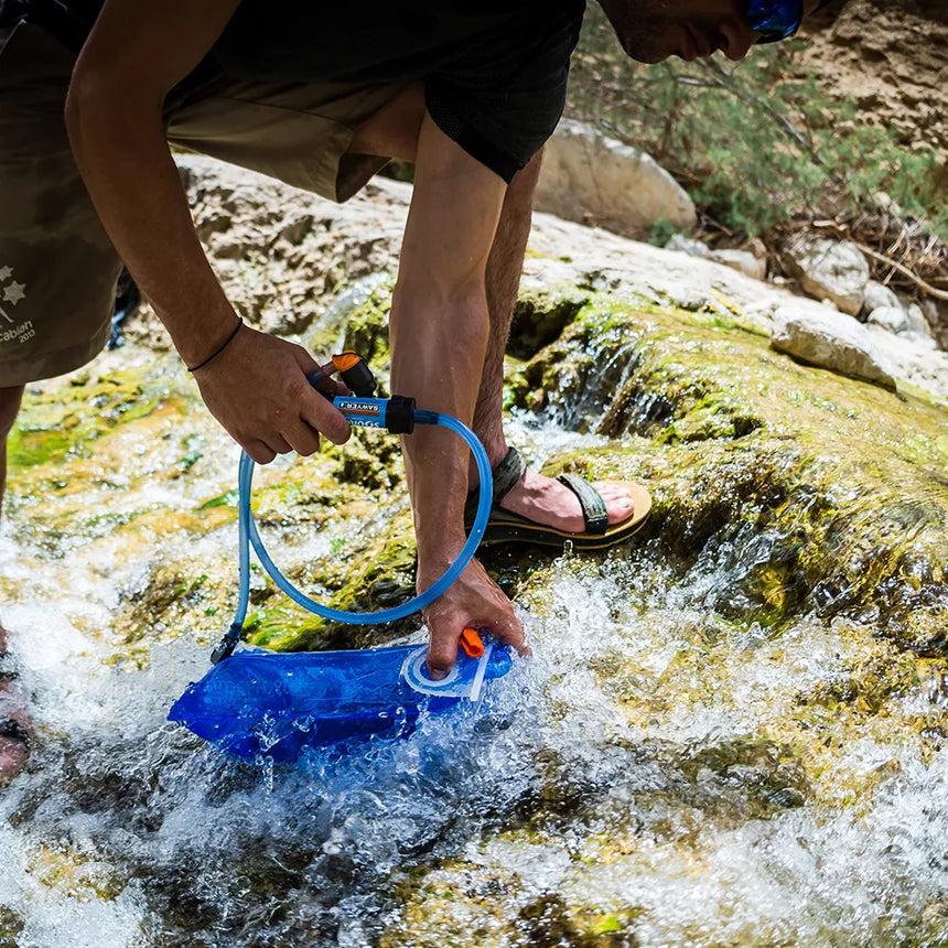 Filtered water stored in hiking bottles